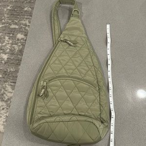 Vera Bradley Olive green quilted sling backpack. NWOT. Never used.